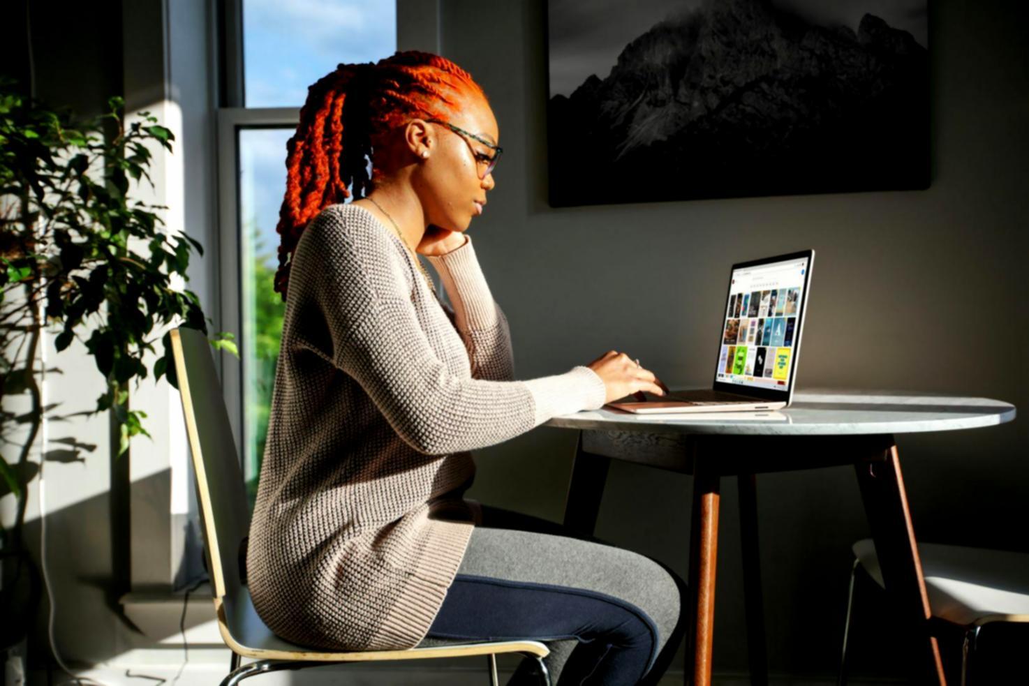 Person working through challenges with focused determination